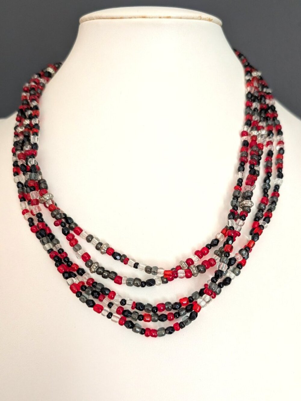 Red, gray, black and clear glass beaded necklace with silver accents